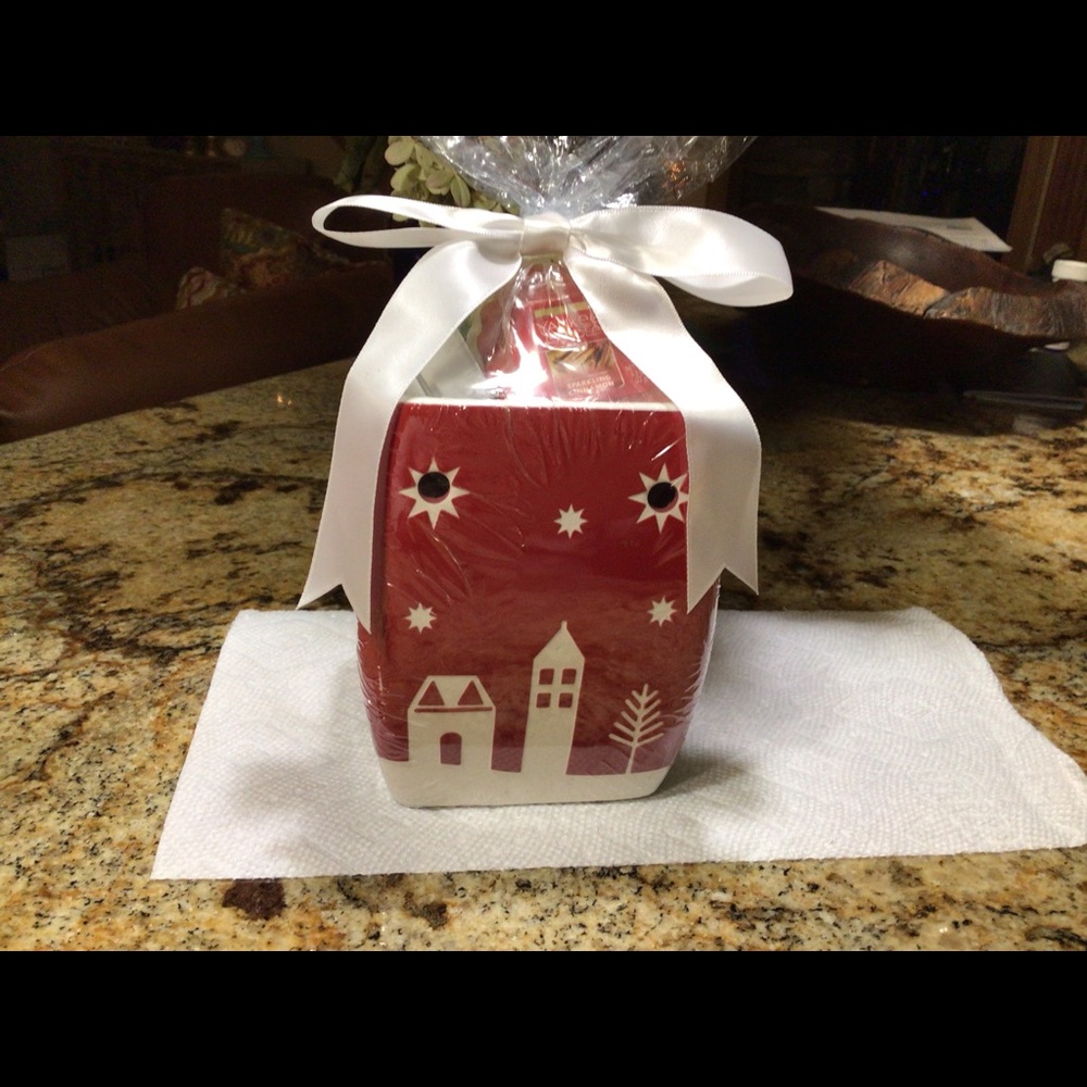 Yankee candle tea light Christmas wax melter in shape of a house. New in wrap.